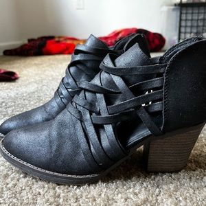 Black cut-out booties.